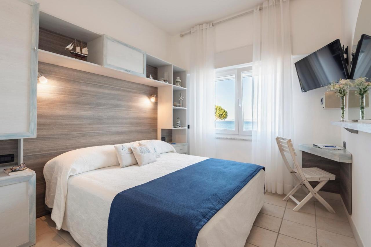 Hotel La Caletta Порто-Санто-Стефано Екстер'єр фото