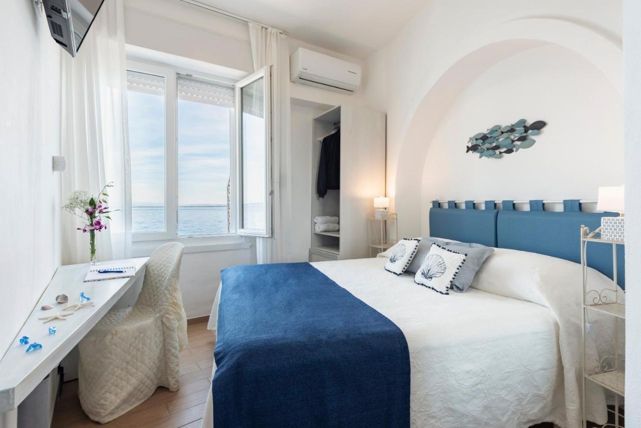 Hotel La Caletta Порто-Санто-Стефано Екстер'єр фото