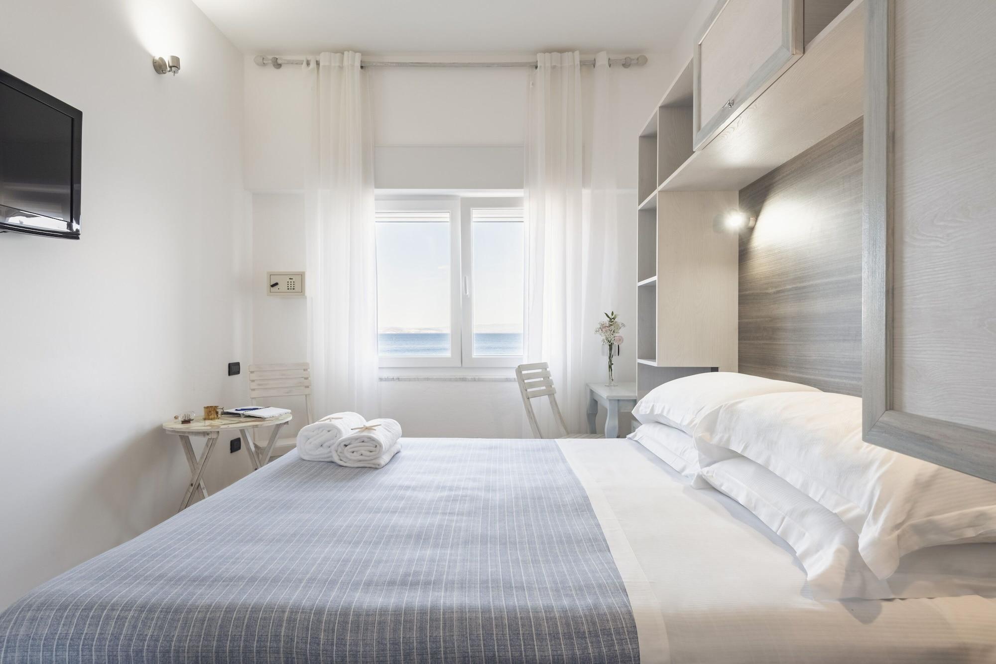 Hotel La Caletta Порто-Санто-Стефано Екстер'єр фото
