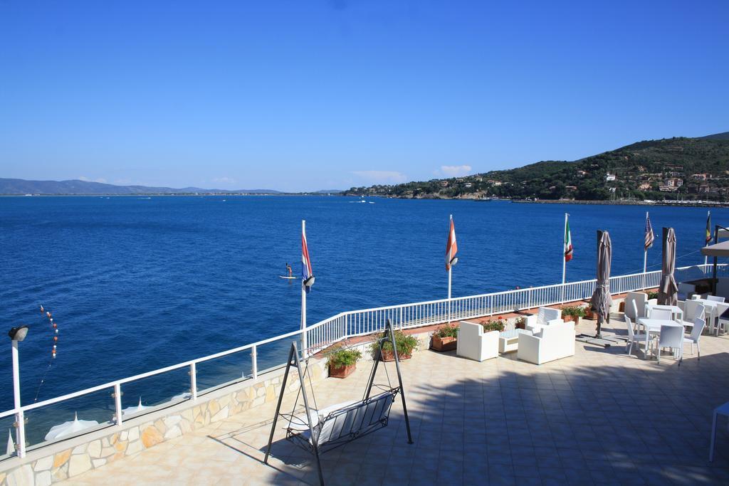 Hotel La Caletta Порто-Санто-Стефано Екстер'єр фото