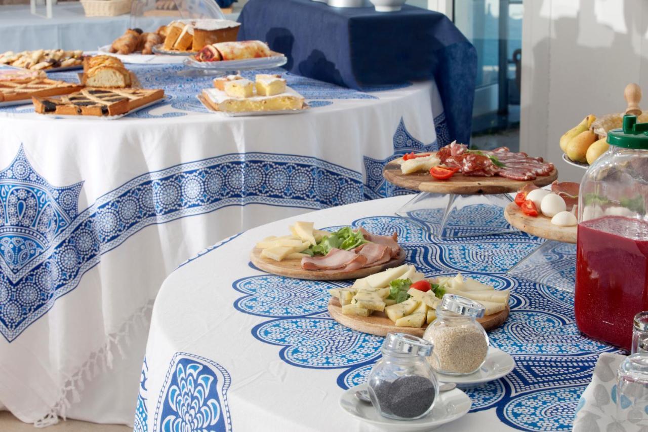 Hotel La Caletta Порто-Санто-Стефано Екстер'єр фото